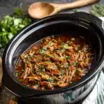 Crock Pot Bourbon Chicken Recipe is a must-try dish! Recipe