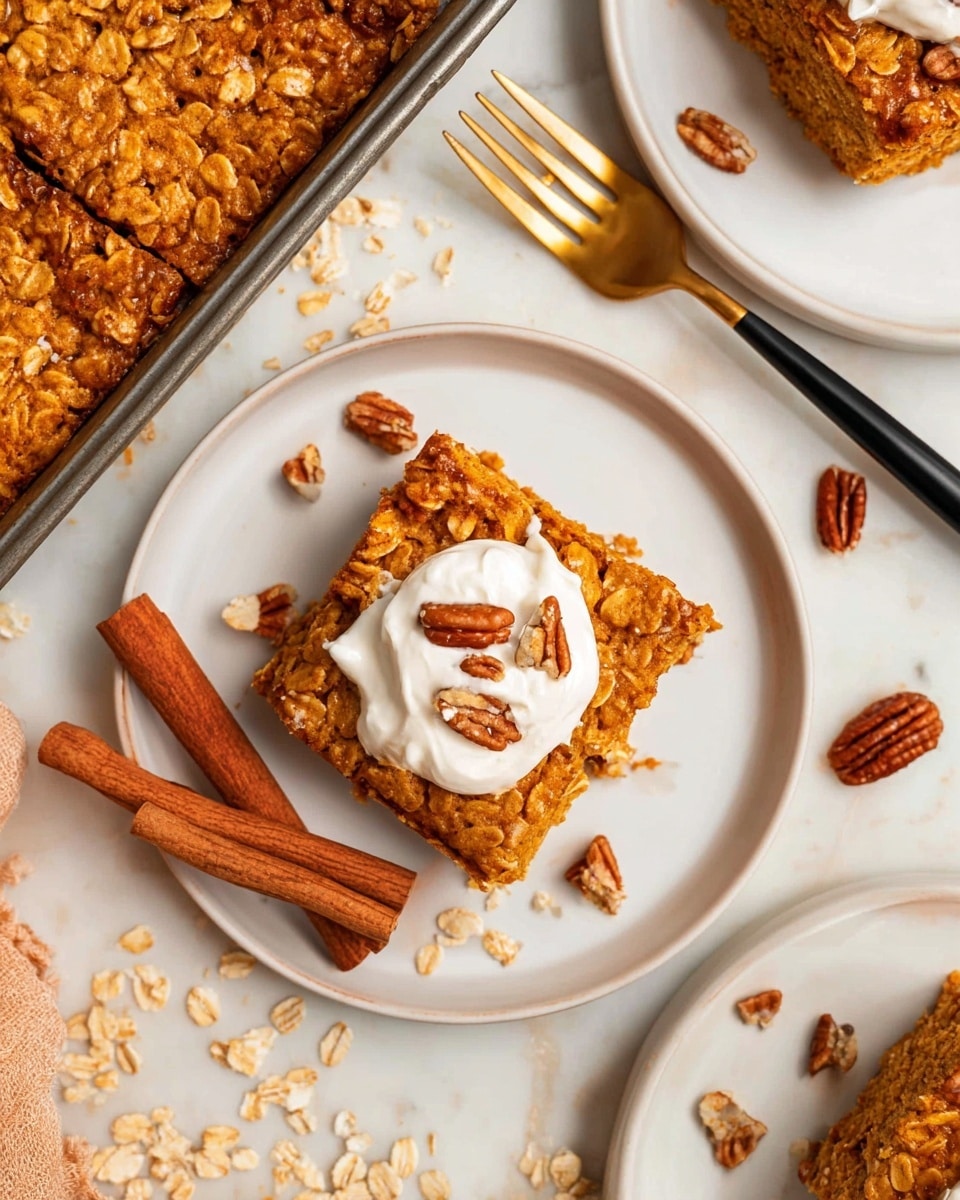 A single square oatmeal bar with a rough texture sits in the center of a white round plate, its oats and spices giving it a warm golden-brown color. On top, a dollop of white creamy whipped cream is placed, sprinkled with small chopped pecan pieces that add texture and color contrast. Two whole cinnamon sticks rest diagonally on the plate beside the bar, while scattered oats and pecan pieces decorate the white marbled surface around the plate. Part of the baking pan with more oatmeal bars is visible in the upper left corner, showing the same warm golden color and coarse oat texture. A gold fork with a black handle lies nearby, and another white plate with a piece of the bar and whipped cream is partially visible above, with a woman's hand holding a piece of the bar with the fork. photo taken with an iphone --ar 4:5 --v 7