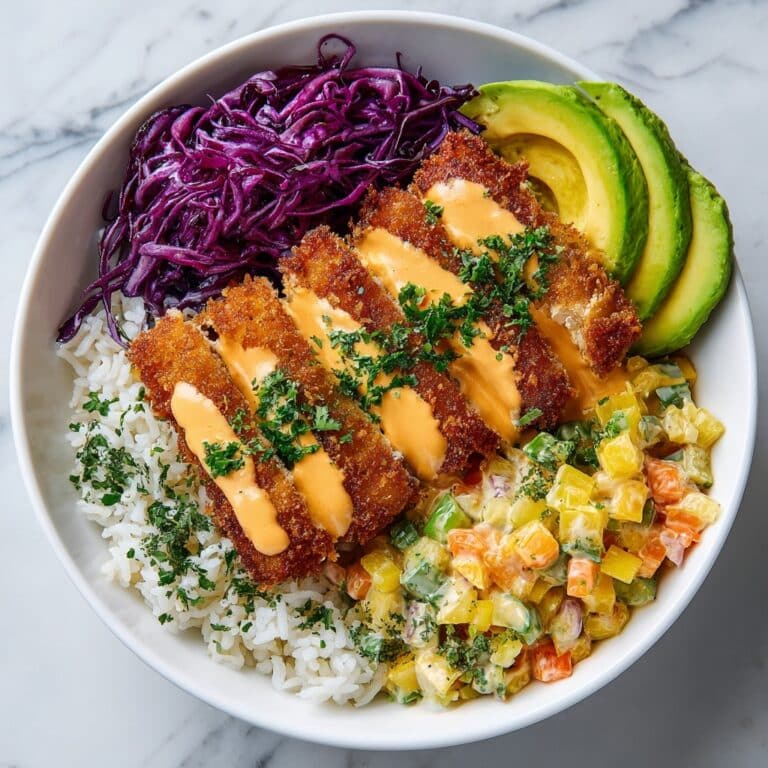 Crispy Fish Taco Bowls with Zesty Slaw and Creamy Chipotle Sauce Recipe